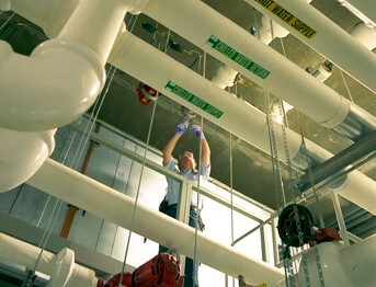 Technician working on a chiller system